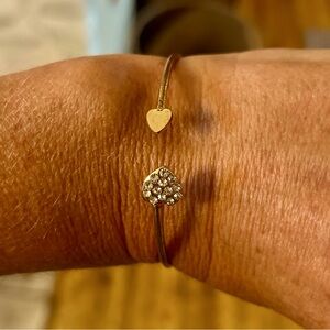 Gold colored and diamond bracelet